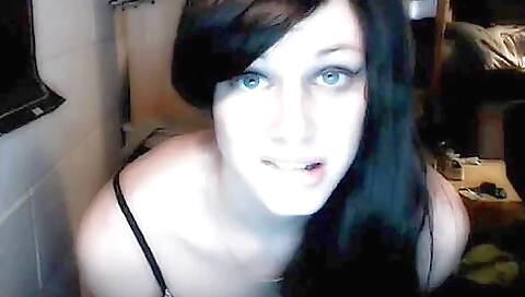 Stunning brunette takes off her stockings and lets the camera film