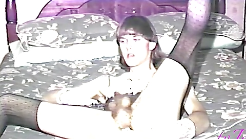 Vintage brunette in stockings and lingerie solo film